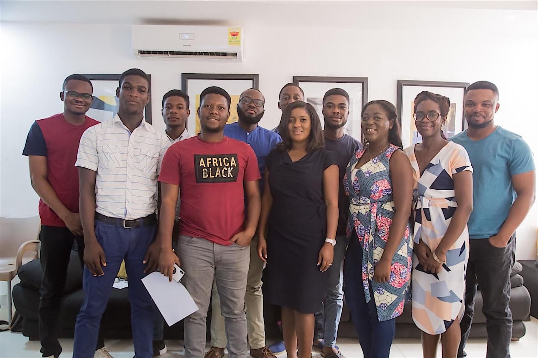 The early Workspace team together in a small office in Accra