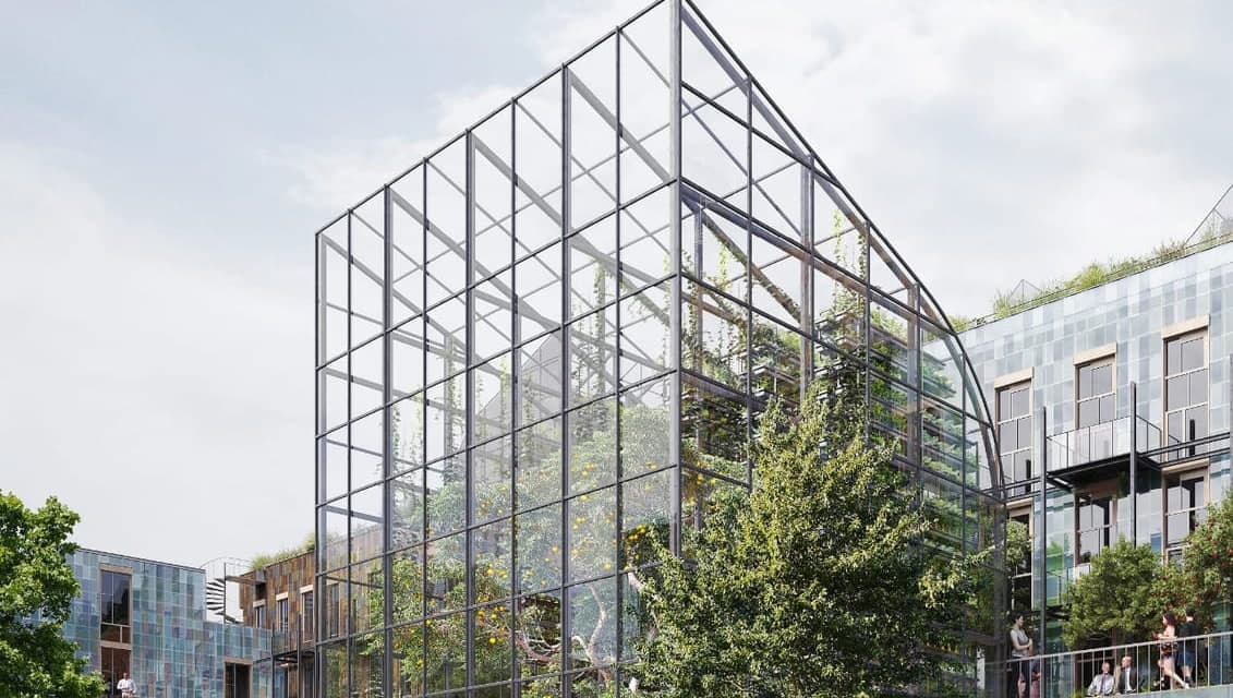 A glass building among trees